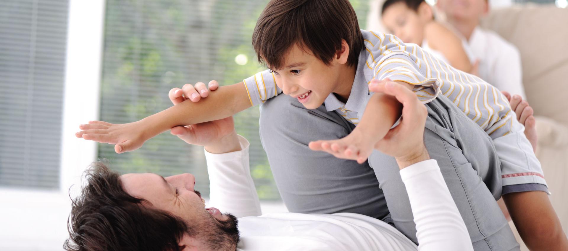 a man holding a small child